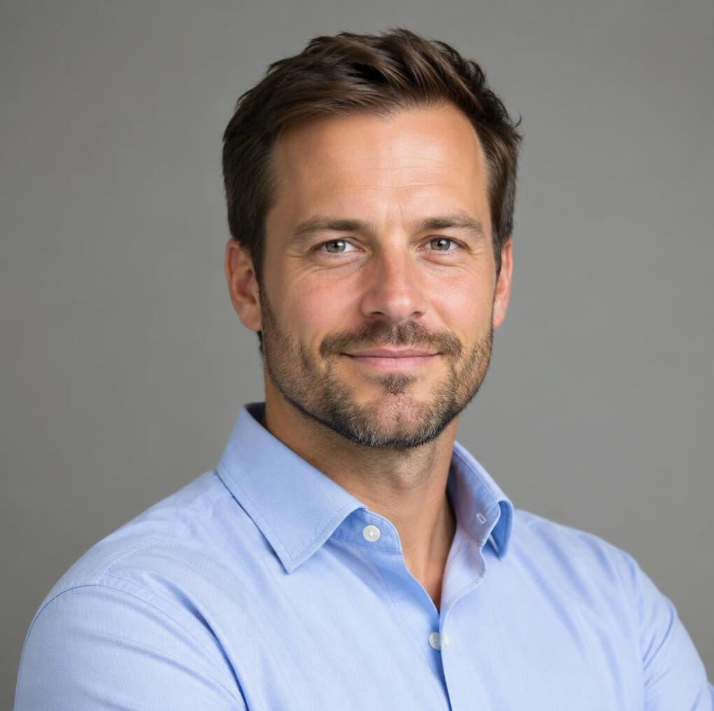 Portrait of a bearded man in a business casual shirt